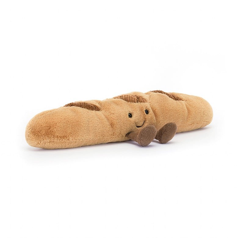 Peluche Amuseables Baguette Jellycat, de profil, couchée