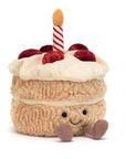 Peluche Amuseables Birthday Cake Jellycat, de face, avec sa bougie