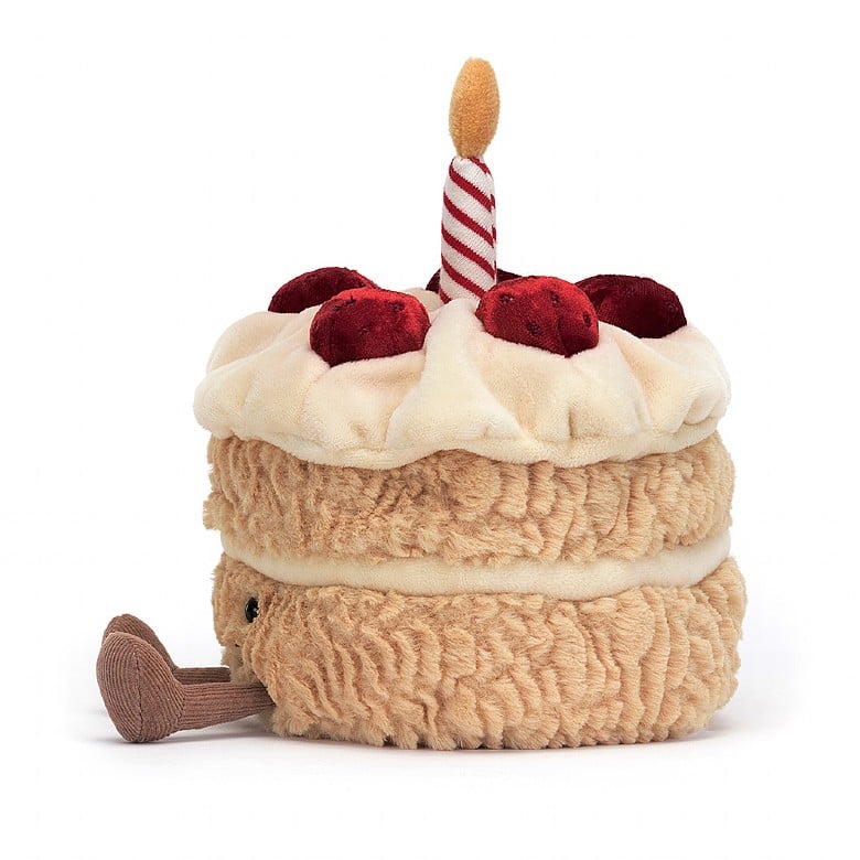 Peluche Amuseables Birthday Cake Jellycat, de profil, avec ses bottines