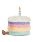 Peluche Amuseables Rainbow Birthday Cake Jellycat, de profil, étages arc-en-ciel