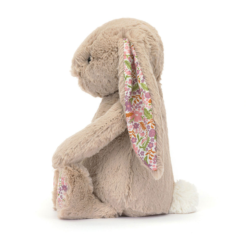 Peluche Blossom Beige Bunny Petal Medium Jellycat, de profil, motif de fleurs roses et violettes