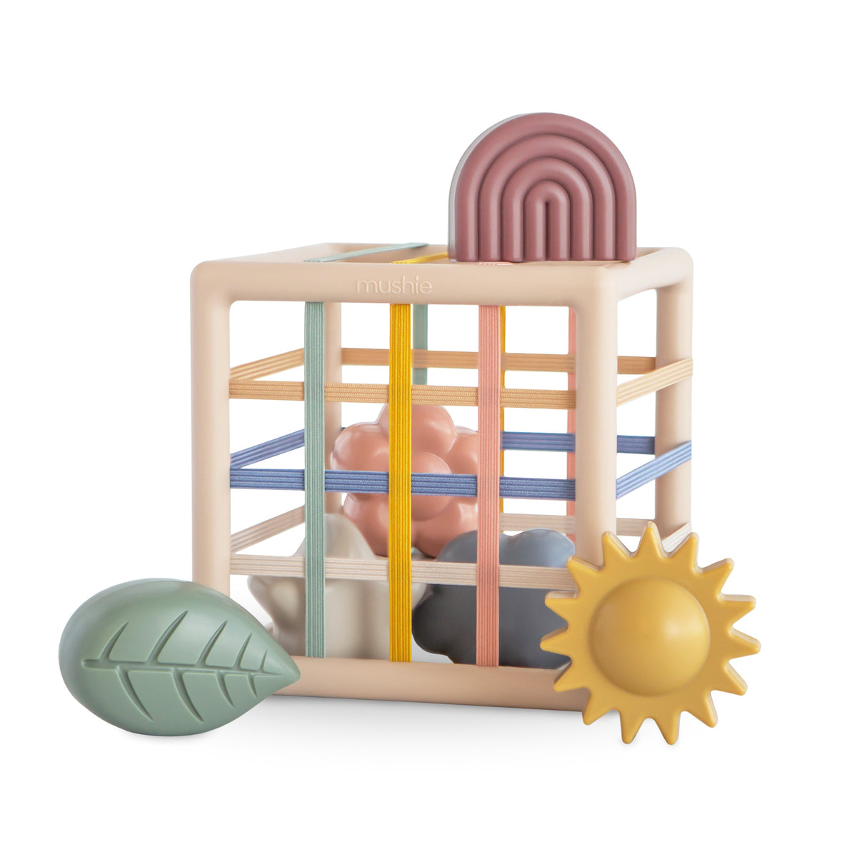 Jouet d'éveil bébé trieur de formes élastique Mushie, formes inspirées de la nature
