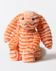 Peluche lapin orange Fizzleskip Bunny Original Jellycat, fourrure douce et oreilles souples