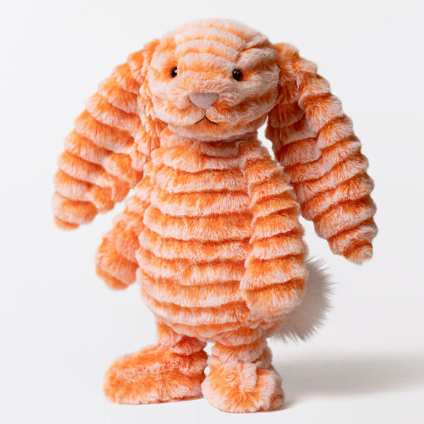 Lapin en peluche Fizzleskip Jellycat à la queue pelucheuse et aux yeux en perles